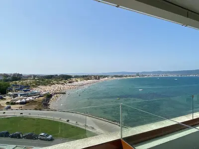 a view of the beach from the balcony of a building at PARADISO 'В' 609 Studio Nessebar Private in Nesebar