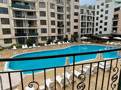 a view of a pool from the balcony of a apartment at AVALON D202 Private Studio Sunny Beach in Sunny Beach