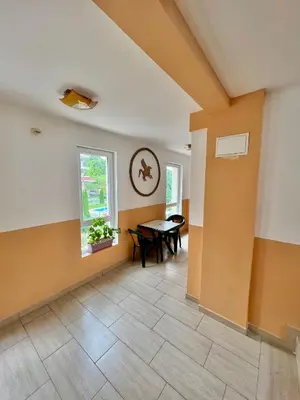 an empty room with a table and a window at SOLITA Apartment with Panoramic View in Byala