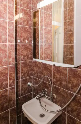 a bathroom with a sink and a mirror at Луксозен апартамент Далия in Varna City