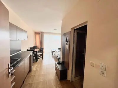 a room with a kitchen and a dining room at Magic Dreams St Vlas in Sunny Beach
