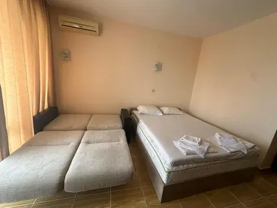 a bedroom with two beds in a room at Magic Dreams St Vlas in Sunny Beach