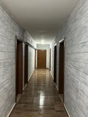 an empty hallway with a door and a hallwayngth at Комплекс Тополица -The beautiful view in Aytos