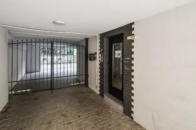 an entrance to a building with a iron gate at Central flat Wi-Fi & streaming in Varna City