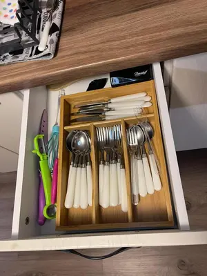 a drawer filled with utensils in a cabinet at ToP center of Varna in Varna City