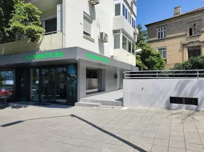 a building with a sign on the front of it at OPAL Beachfront Apartment in Varna City