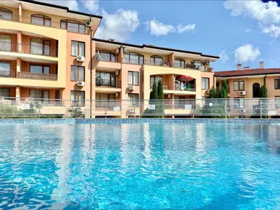 a large swimming pool in front of a building at Panorama Dreams - Menada Apartments in Sveti Vlas