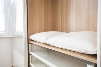 a bed on a shelf in a room at Demokratsia bl 117 in Burgas City