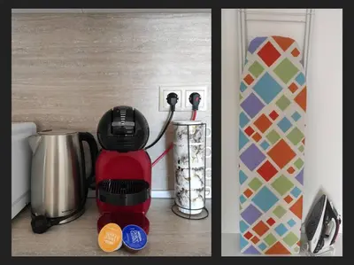 a red coffee maker sitting on top of a counter at Beachfront Panoramic Flat @ South Bay residence in Varna City