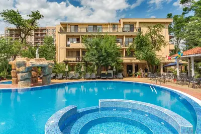 a large swimming pool in front of a building at Hotel Venus in Sunny Beach