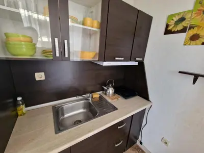 a kitchen with a sink and a counter top at Słoneczny Brzeg Studio Amara in Sunny Beach