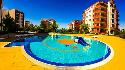 a large swimming pool in the middle of a city at William's apartments - sixth large apartment in Sveti Vlas
