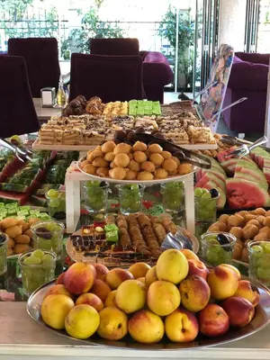 a buffet of different types of food on a table at Avenue Deluxe Hotel in Sunny Beach