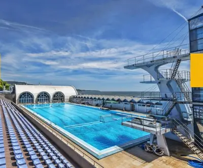 a large swimming pool on a cruise ship at Festival and Congress Centre Appartment Varna in Varna City