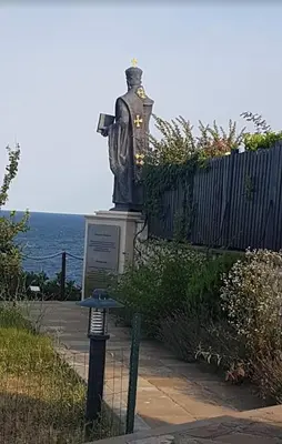 a statue of a woman sitting on top of a monument at Sozopol Созопол- SOZOPOLIS -MORE SUN 2А- in Sozopol