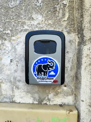 a sign on a wall with a monkey on it at Podslon Varna Vibes in Varna City