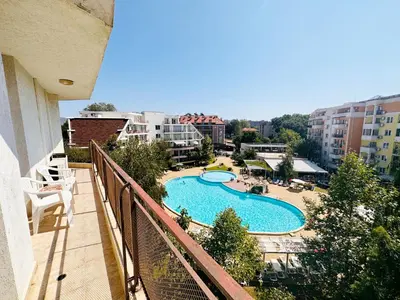 a view of a swimming pool from a balcony at Two-bed flat in Sunny Beach with pool view in Sunny Beach