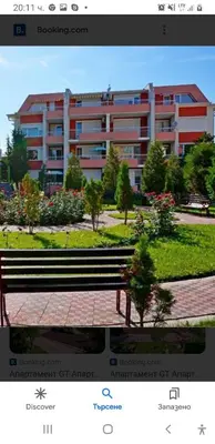 a picture of a bench in front of a building at Sunny Fort apartments Sanny Beach Parking Free in Sunny Beach