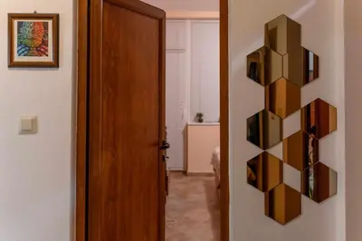 a hallway with a door to a room at Sea Time Sozopol in Sozopol