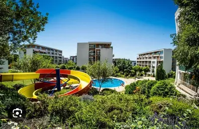 a water park with a slide and a pool at Paradise View in Sunny Beach