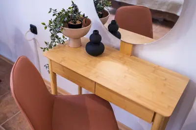 a table with two chairs and a mirror at The Cozy Hub, Varna in Varna City