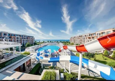 a water slide at a resort with a pool at Premier Fort Beach ap. №376 section: E-3 in Sveti Vlas
