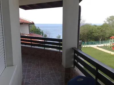 a balcony with a view of the ocean at Caprice Apartment in Lozenec in Kiten