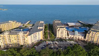 an aerial view of a resort near the ocean at DL Apartments in Aheloy