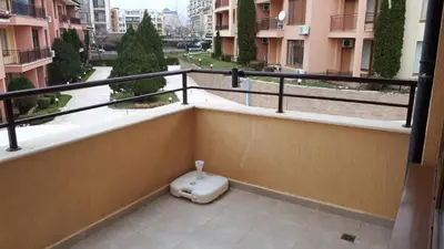 a balcony with a toilet on the floor of a building at Panorama Dreams - Sveti Vlas - Furnished Apartment with a Terrace and a Sea View in Sveti Vlas