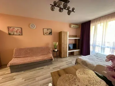 a bedroom with a bed and a table at Studio Sveti Vlas SEA BREEZE 3 in Sveti Vlas