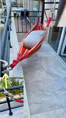 a red hammock on a balcony of a building at Top Studio in Big Kamelia Holiday Complex Sunny Beach in Sunny Beach