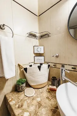 a bathroom with a sink and a bath tub at Bella boutique apartment in Sunny Beach