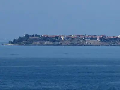 a large body of water with a city in the background at Studio Robinson Beach Sea Nessebar View in Sveti Vlas