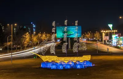 a large sculpture in a park at night at Batak Studio in Burgas City