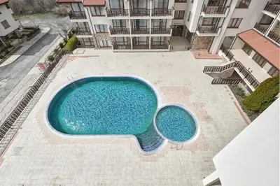 an overhead view of a swimming pool in a building at Perfect Seaside Retreat in Sveti Vlas Relax Complex by Flat Mаnаger in Sunny Beach