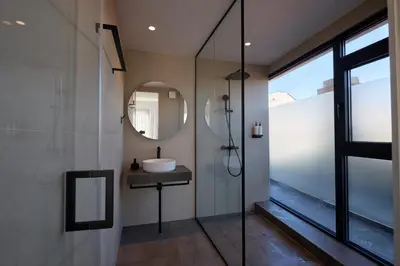 a bathroom with a sink and a mirror at Bizarre Boutique Hotel in Varna City