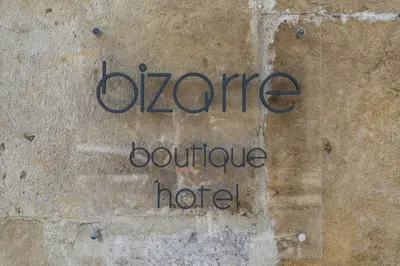 a sign on a wall that says dance bounceeper at Bizarre Boutique Hotel in Varna City