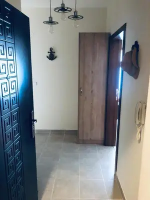 a room with a door and a tile floor at Сънрайз Данаилов in Obzor