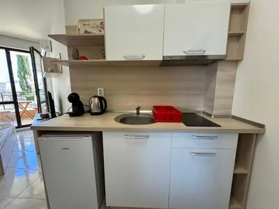 a kitchen with a sink and a counter top at HORIZON 7 'А' Studio Sveti Vlas in Sveti Vlas