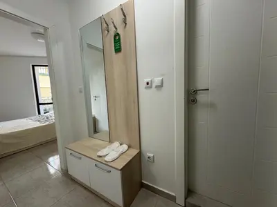 a bathroom with a sink and a mirror in it at HORIZON 1 'A' APARTMENT Sveti Vlas in Sveti Vlas