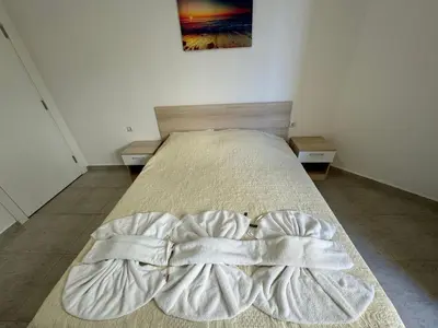 a bed with two white pillows on top of it at HORIZON 1 'A' APARTMENT Sveti Vlas in Sveti Vlas