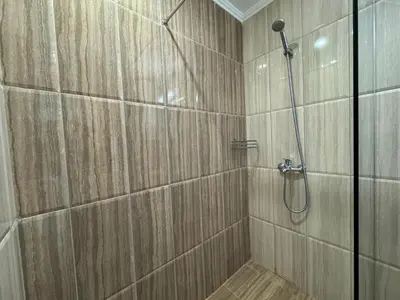 a bathroom with a shower with a glass door at HORIZON 12 'A' APARTMENT Sveti Vlas in Sveti Vlas