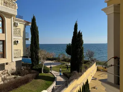 a view of the ocean from a building at HORIZON 13 'A' APARTMENT Sveti Vlas in Sveti Vlas