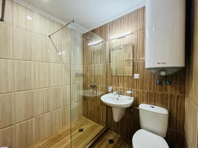 a bathroom with a toilet and a sink at HORIZON 26 'Б' Apartment Sveti Vlas in Sveti Vlas
