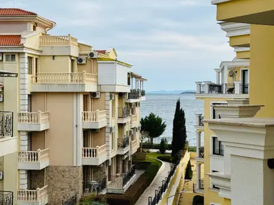 a view of a row of buildings in front of the ocean at HORIZON 25 'Б' Apartment Sveti Vlas in Sveti Vlas