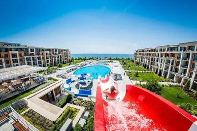 an aerial view of a water ride at a resort at Seaside Serenity Studio - Premier Fort Beach in Sveti Vlas