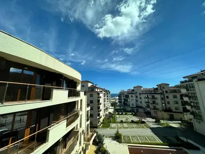 a view of an apartment complex with buildings at Sunshine apartment in Shkorpilovtsi