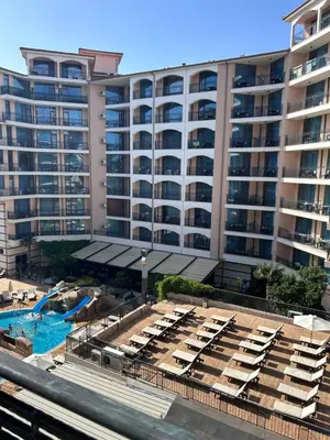 an aerial view of a large apartment building with a pool at Karolina Apartment 65 in Sunny Beach