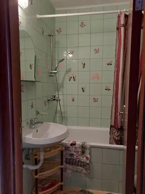 a bathroom with a sink and a bath tub at Студия в центре Солнечного берега in Sunny Beach