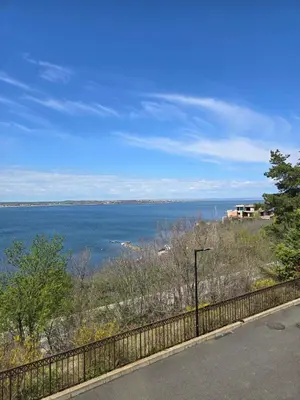 a view of the ocean from a fence at Sozopol Santa Marina Sea View Studio in Sozopol